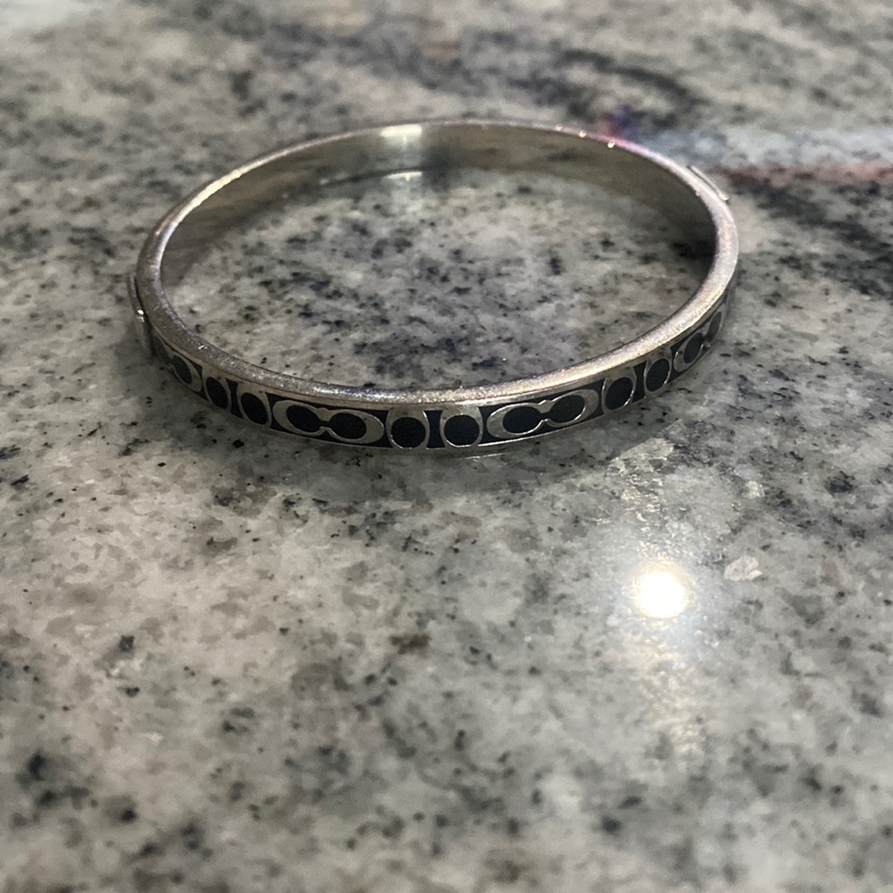 Cute silver tone coach bracelet